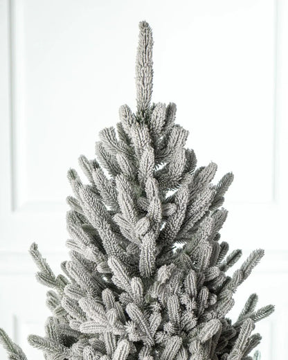 Traditional Snowy Christmas Tree