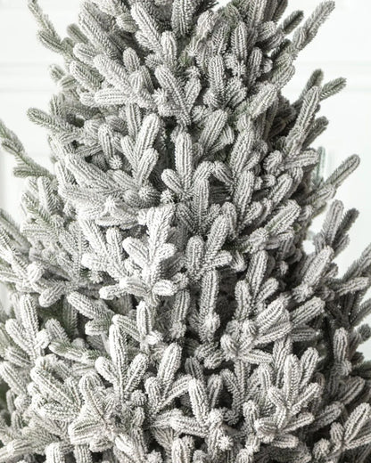 Traditional Snowy Christmas Tree